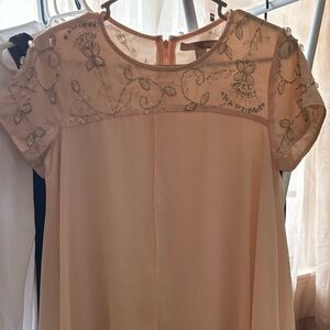 Two gently used dresses for sale.